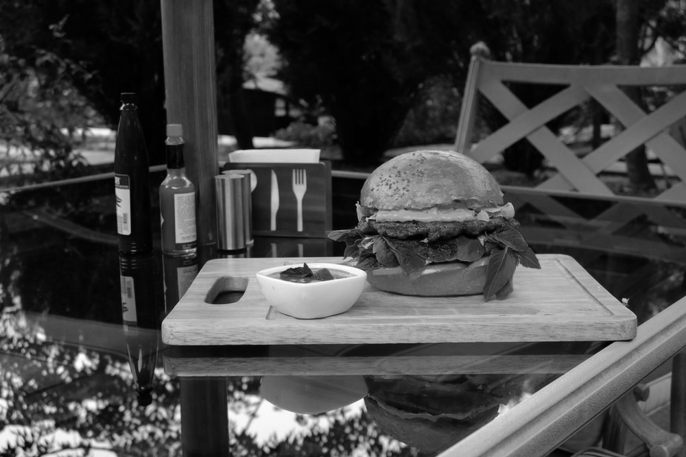a burger meal on a table in a restaurant