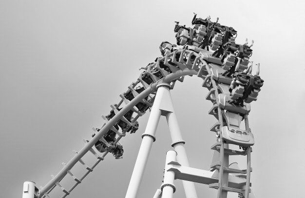 people on a rollercoaster