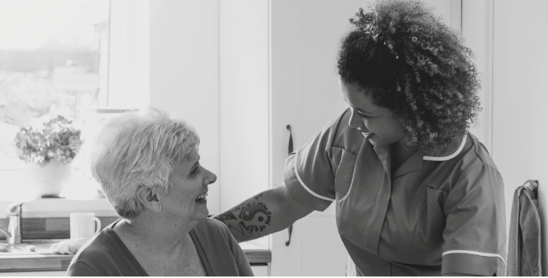 a nurse caring for an elderly women