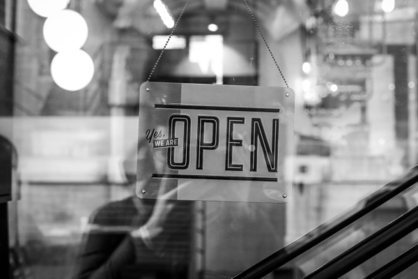 retail open sign on a shop window